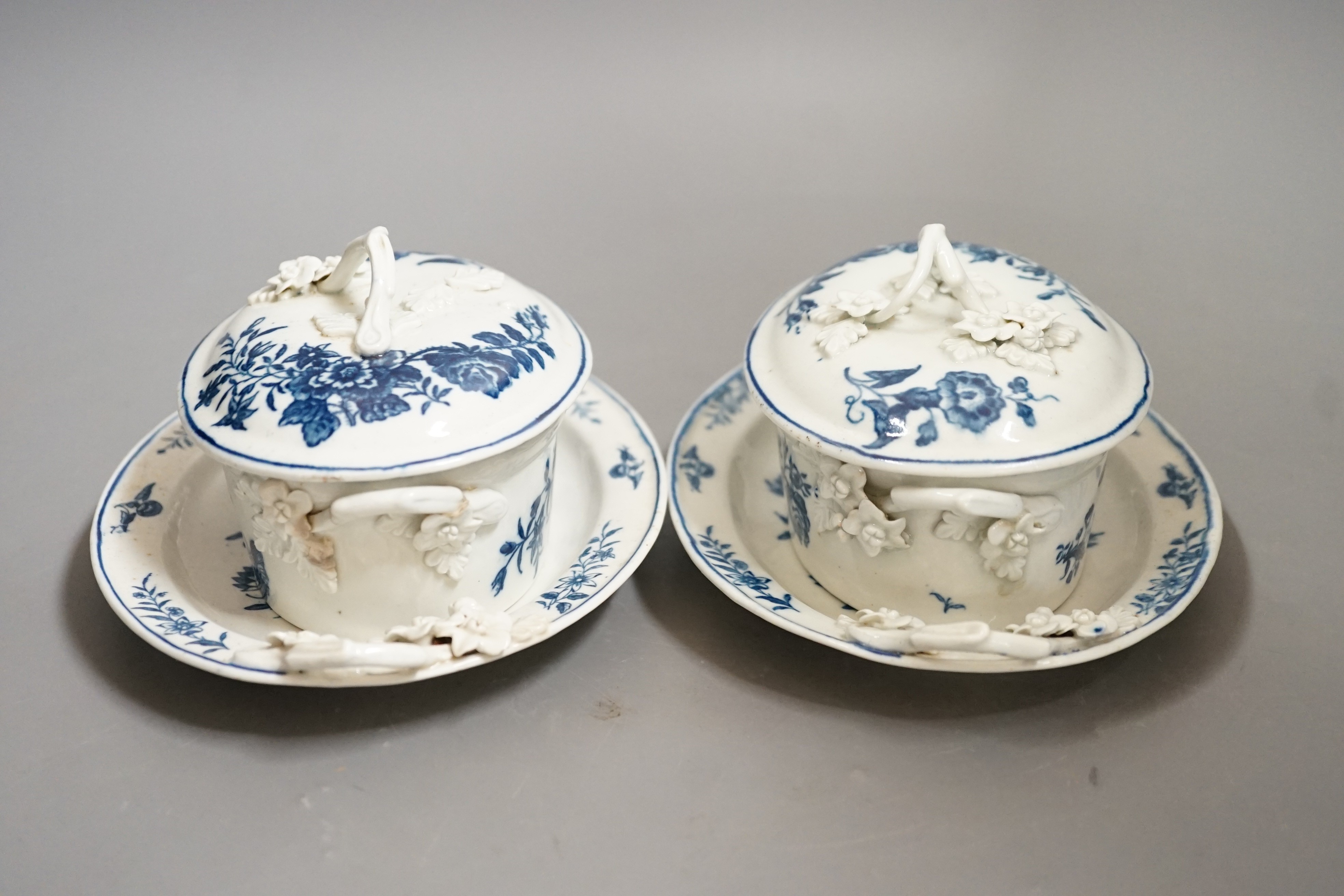 A pair of Caughley blue and white butter tubs, covers and stands, c.1780, stands 19cms wide, tubs and covers 9cms high